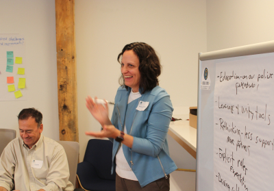 Stephanie leading a presentation at CEE