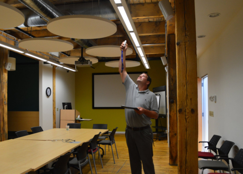 worker checking lightbulbs