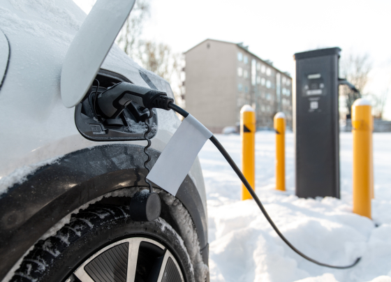 EV charging at a public charger during the winter